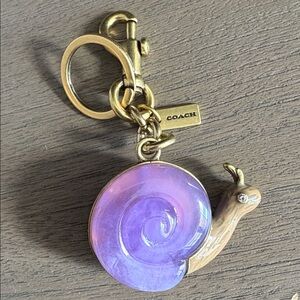 BRAND NEW COACH Purple & Brass Snail Keychain Charm with original pouch